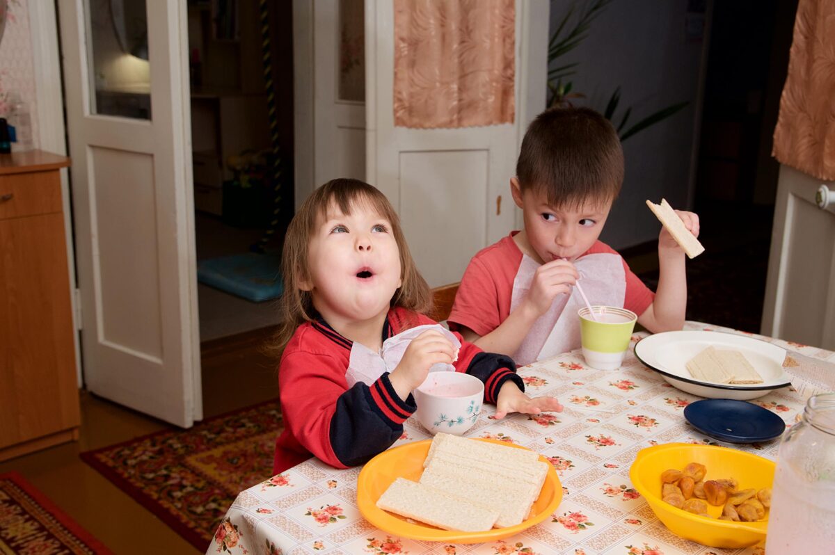 Two children eating