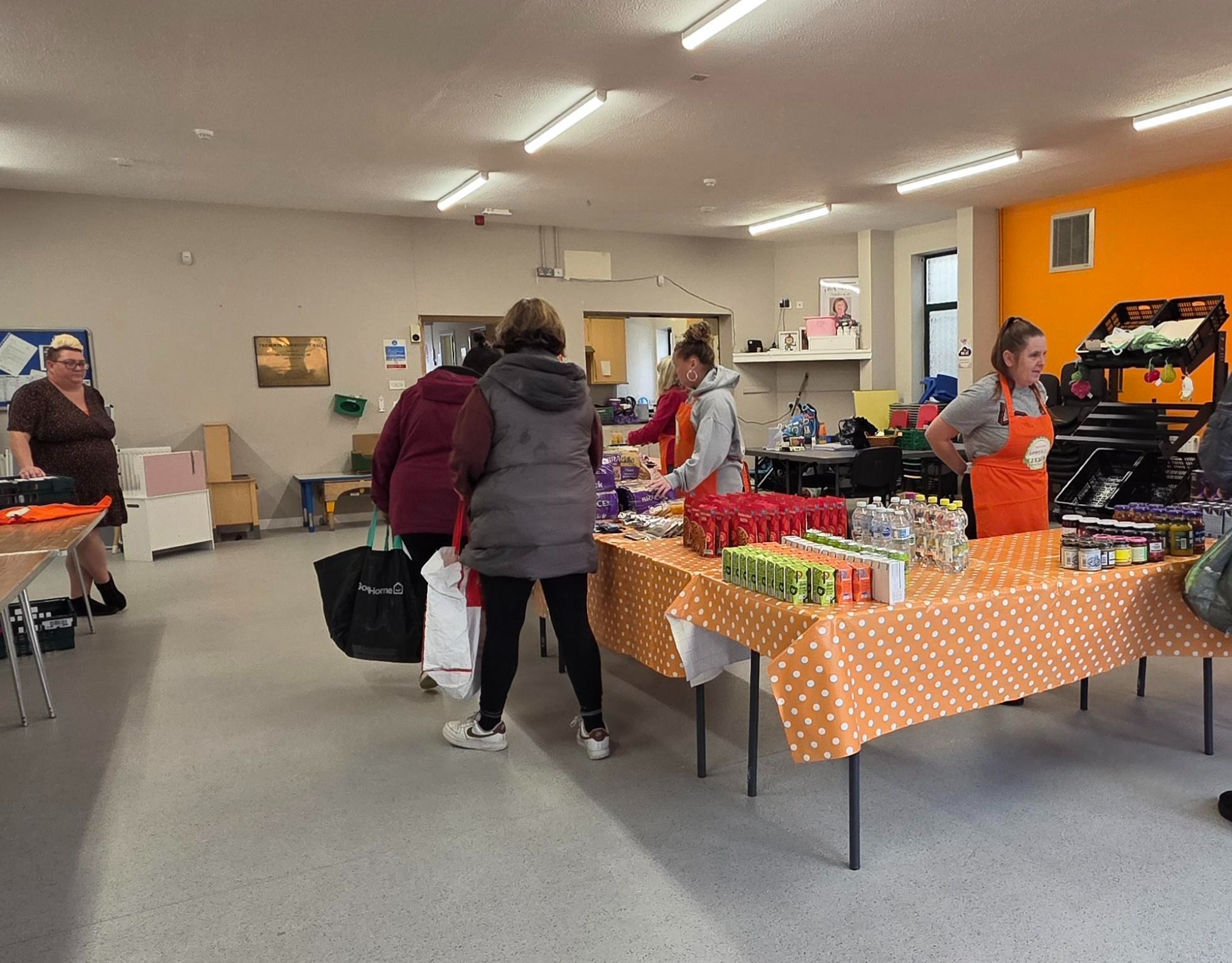 Volunteers sharing surplus food at Tremorfa Community Pantry